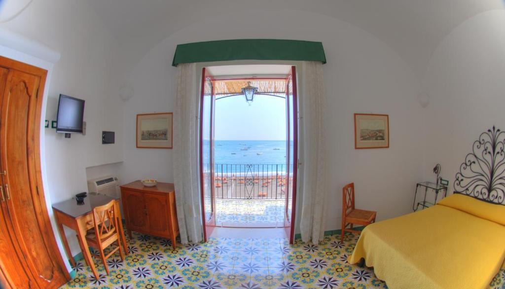La Caravella Di Positano - Relais, Beach & Residences Quarto foto