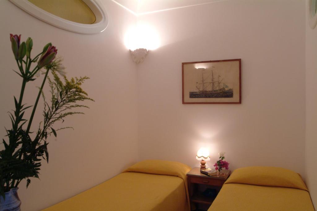 La Caravella Di Positano - Relais, Beach & Residences Quarto foto